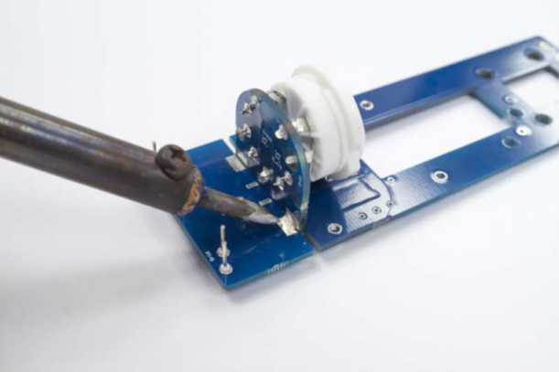Completed 90-degree PCB join soldered from both sides.